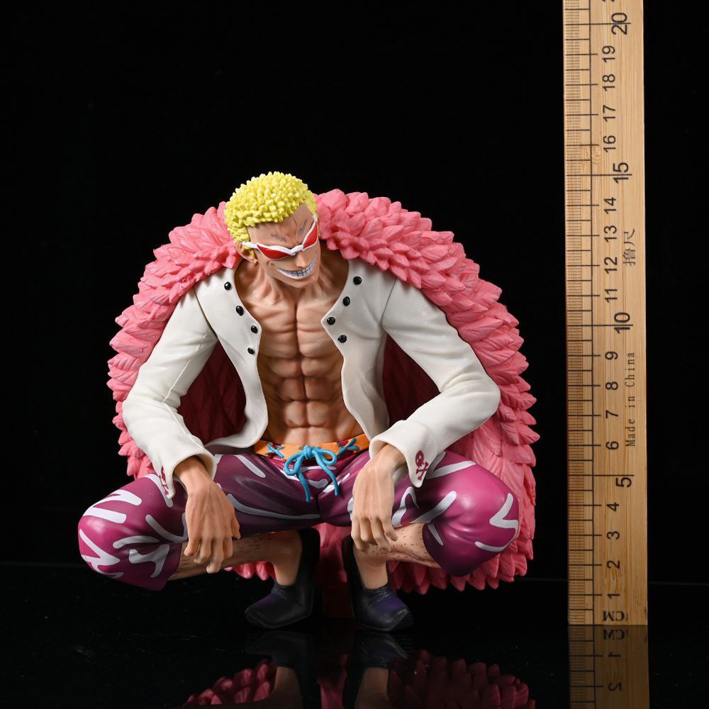 One Piece Shichibukai Doflamingo, crouching double-headed sculpted figure with Devil Fruit powers.