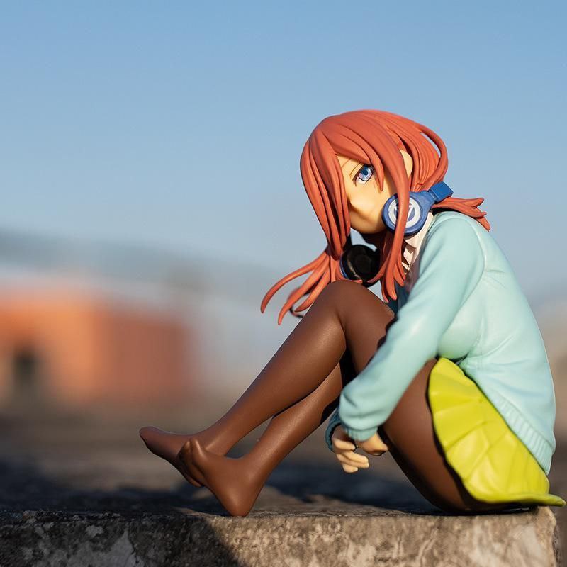 Anime figure of Miku Nakano from "The Quintessential Quintuplets" - a desk-bound girl figure for decorating anime rooms.