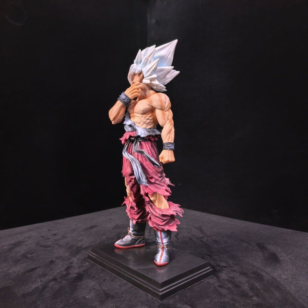 Dragon Ball Super Saiyan 1 Goku figure, Goku face-pinching figure, battle-damaged Super Saiyan 1 figure, anime figure, decorative item.