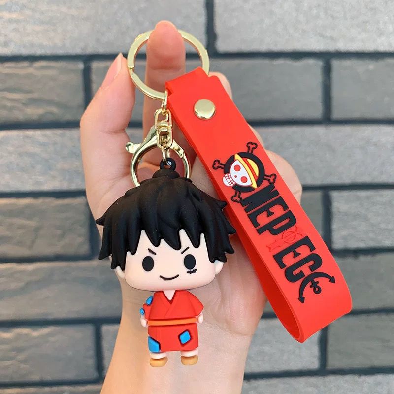Creative cartoon One Piece keychains featuring Luffy, Chopper, Zoro, Sanji, and Law – cute keychains and bag charms for men and women.