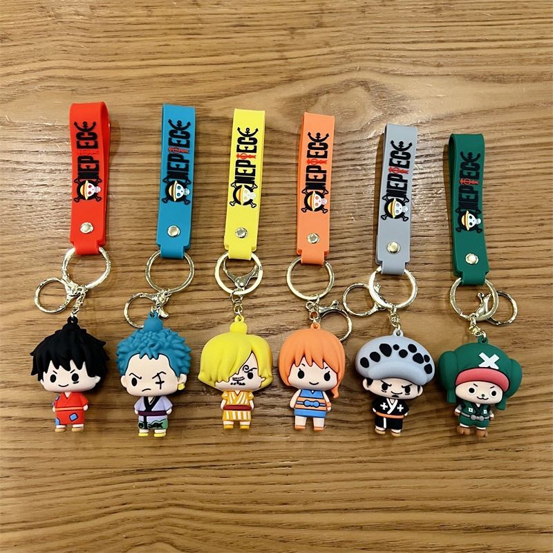Creative cartoon One Piece keychains featuring Luffy, Chopper, Zoro, Sanji, and Law – cute keychains and bag charms for men and women.