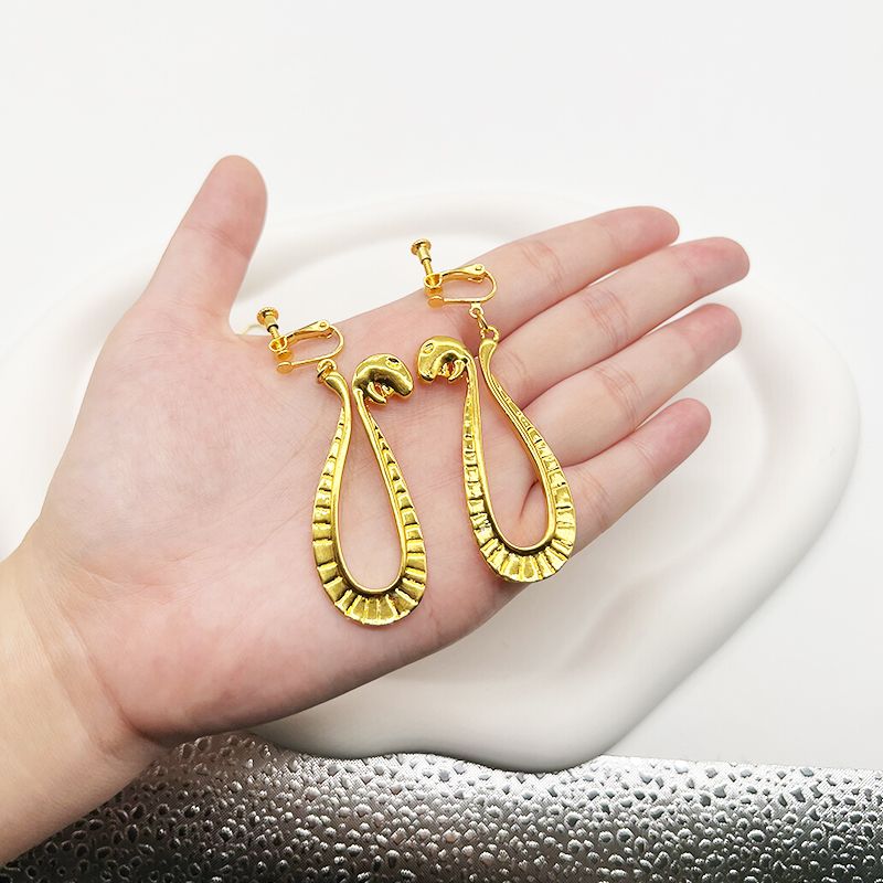 Snake-shaped earrings inspired by Boa Hancock from One Piece, perfect for cosplay.