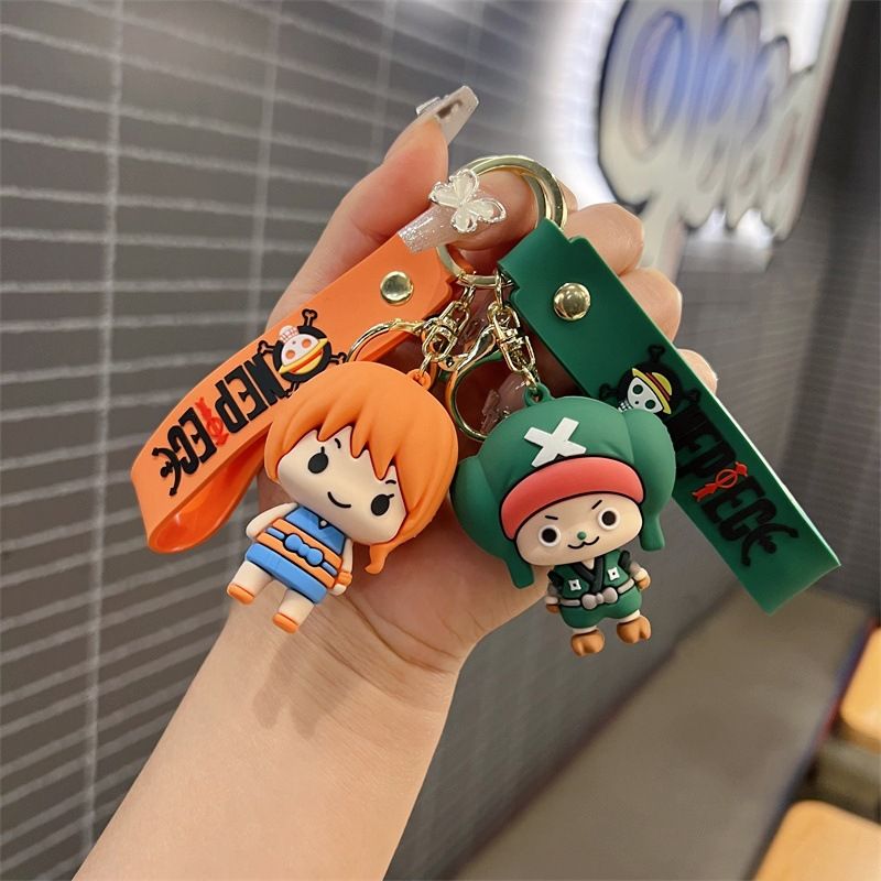 Creative cartoon One Piece keychains featuring Luffy, Chopper, Zoro, Sanji, and Law – cute keychains and bag charms for men and women.