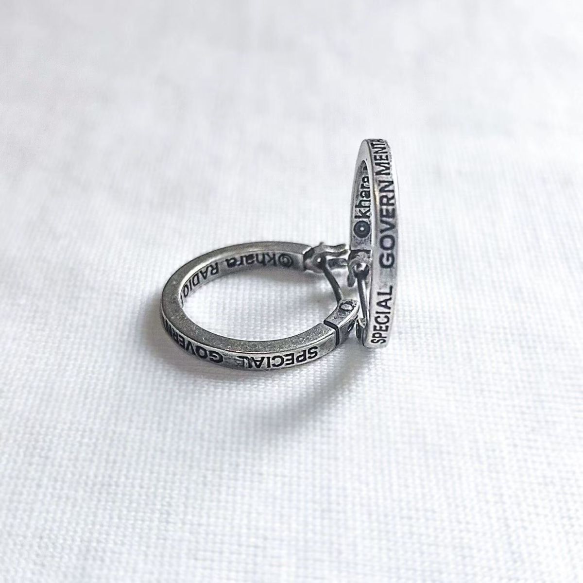 Classic hoop earrings with letter pattern and distressed finish, inspired by the anime character Kaworu Yoneyama. Suitable for both men and women.